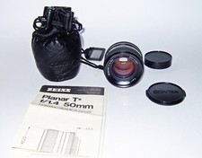 Contax Zeiss 50mm f/1.4 completo di tappi, custodia, foglio caratteristiche.