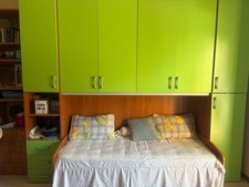 armadio a ponte con doppio letto