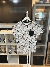 *RARA* T-shirt tascabile