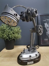 Lampada da scrivania a pistone