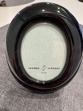 RARA cornice ovale in ebano Seaman Schepps di lusso