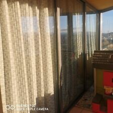 Vetrata Scorrevole con profilo in alluminio di colore grigio e con vetro termico