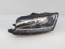 6V1941015D LEFT HEADLIGHT /