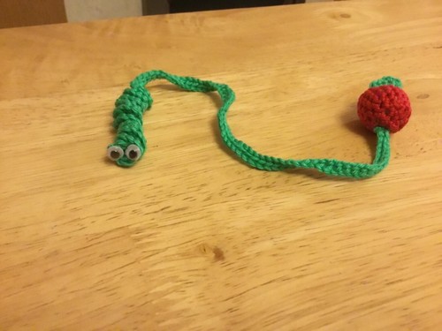 Handmade crochet bookworm and