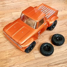 Combo carrozzeria e pneumatici Proline '66 Ford F-100 - Bello! Arancione, Nero, 12 mm, Taglio 4x4