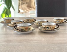 Set 7 antiche tazze e piattini