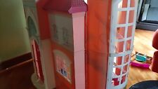casa di barbie rosa e bianca con ascensore Mattel usata ma ben tenuta.