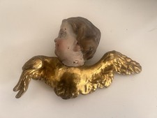 testa di angelo alata antica