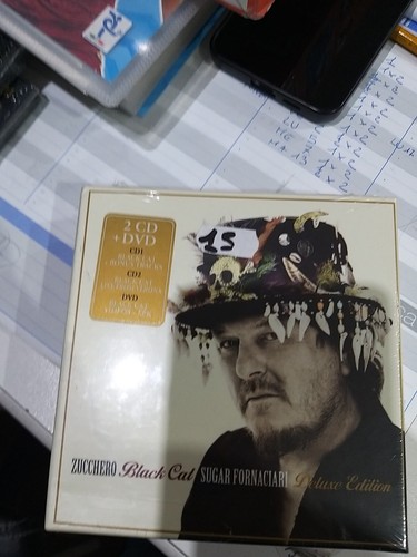 Zucchero black cat - zucchero,