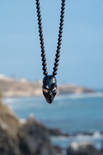 Collana testa aliena in - di,