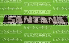  TARGHETTA SANTANA MASCHERINA SUZUKI SAMURAI SJ413 SJ410 STEMMA FREGIO emblema