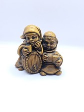 Jolly Wooden Monks Sharing a