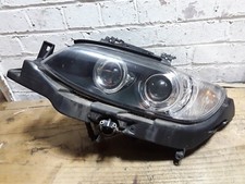 Faro proiettore sinistro