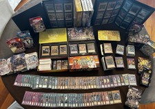 Collezione intera carte Yu-gi-oh ( con 2 album, deck e Tin)