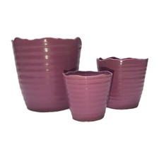 Tris di vasi in ceramica rosa