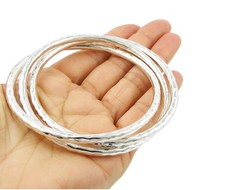 Set di 3 braccialetti in