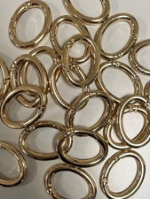 Moschettoni dorati ovali lavorazione flat.