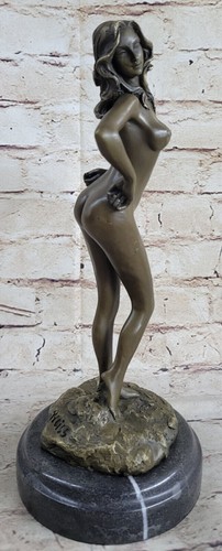 Scultura bronzo donna - in,