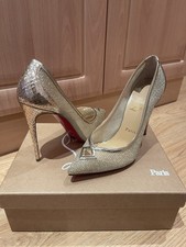 Christian Louboutin tacco oro