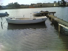 BARCA IN VETRORESINA CON MOTORE FUORIBORDO CV 25 - 