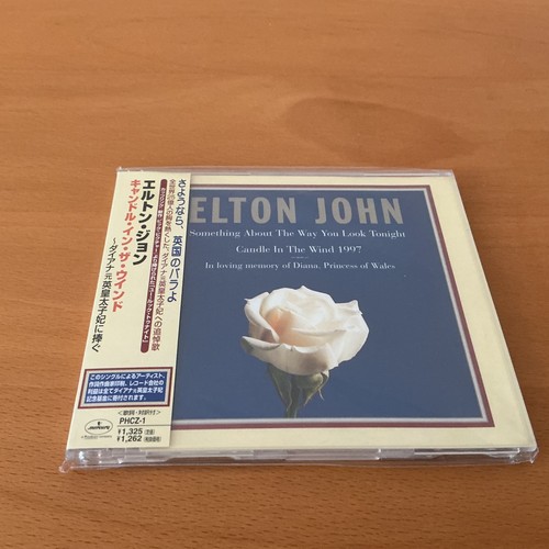 Elton john something about the - john,