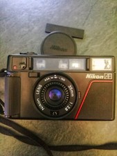 NIKON L35 AF COMPATTA FUNZIONANTE CON CONTENITORE ORIGINALE