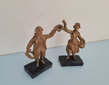 COPPIA SCULTURE  doratura al