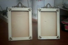 coppia quadretti  cornici con appoggio in legno e vetro cm 13 x 21 lievi difetti