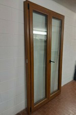 PORTA FINESTRA IN LEGNO E PVC CON VETRI TERMICI APERTURA CON ANTA A SBALZO 