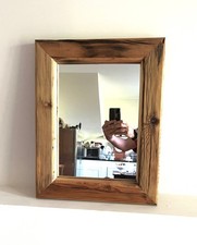 Specchio con cornice in legno