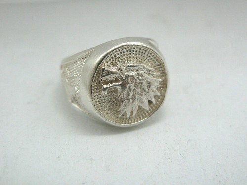 Anello uomo testa - testa, in