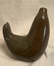 Scultura uccellino pietra