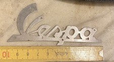 Vespa written front shield