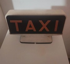 Insegna Taxi