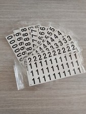 Foglio Numeri ADESIVI neri su bianco 3,4x2,4 cm striscia da 10 pezzi