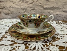 Antica tazza, piattino e