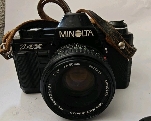 Minolta 300 con objetivo - minolta, x-300
