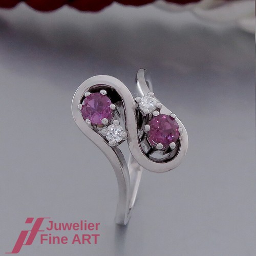 Anello rubino con pietre - in,