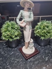 Bellissima statuina porcellana