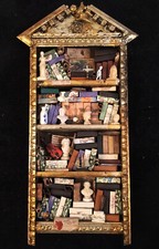 Quadro in legno con oggetti in