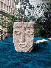 Lampe visage en pierre