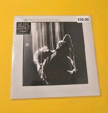  U2 –  Wide Awake In