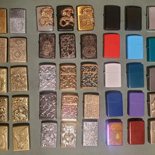 400. Accendini da rivendere. Diverse marche. Ottone, ghiaccio, draghi, misterioso...