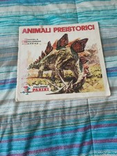 Album  ANIMALI PREISTORICI PANINI 1974 incompleto Pagina Centrale Staccata