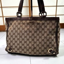 Borsa a tracolla Gucci Abbey Tote GG tela pelle logo beige marrone oro ferramenta