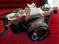 CANON AV1 MADE IN JAPAN NON TESTATO PER USO ESPOSIZIONE /RICAMBI O DA  RIVEDERE 