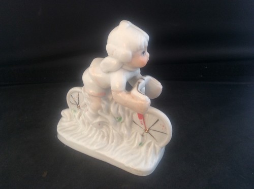 Statuina ciclismo porcellana