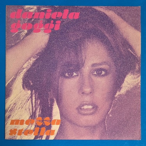 Daniela goggi mezza - -,