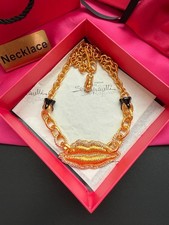 Collana bocca in ottone