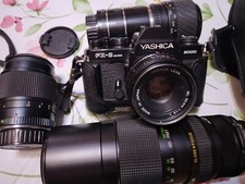 YASCHICA FOTOCAMERA REFLEX ANALOGICA  CON TRE OBIETTIVI MAI USATI - LEGGI SOTTO